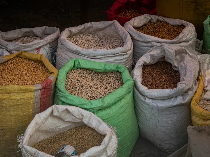 Fabric sacks filled with dried beans and grains